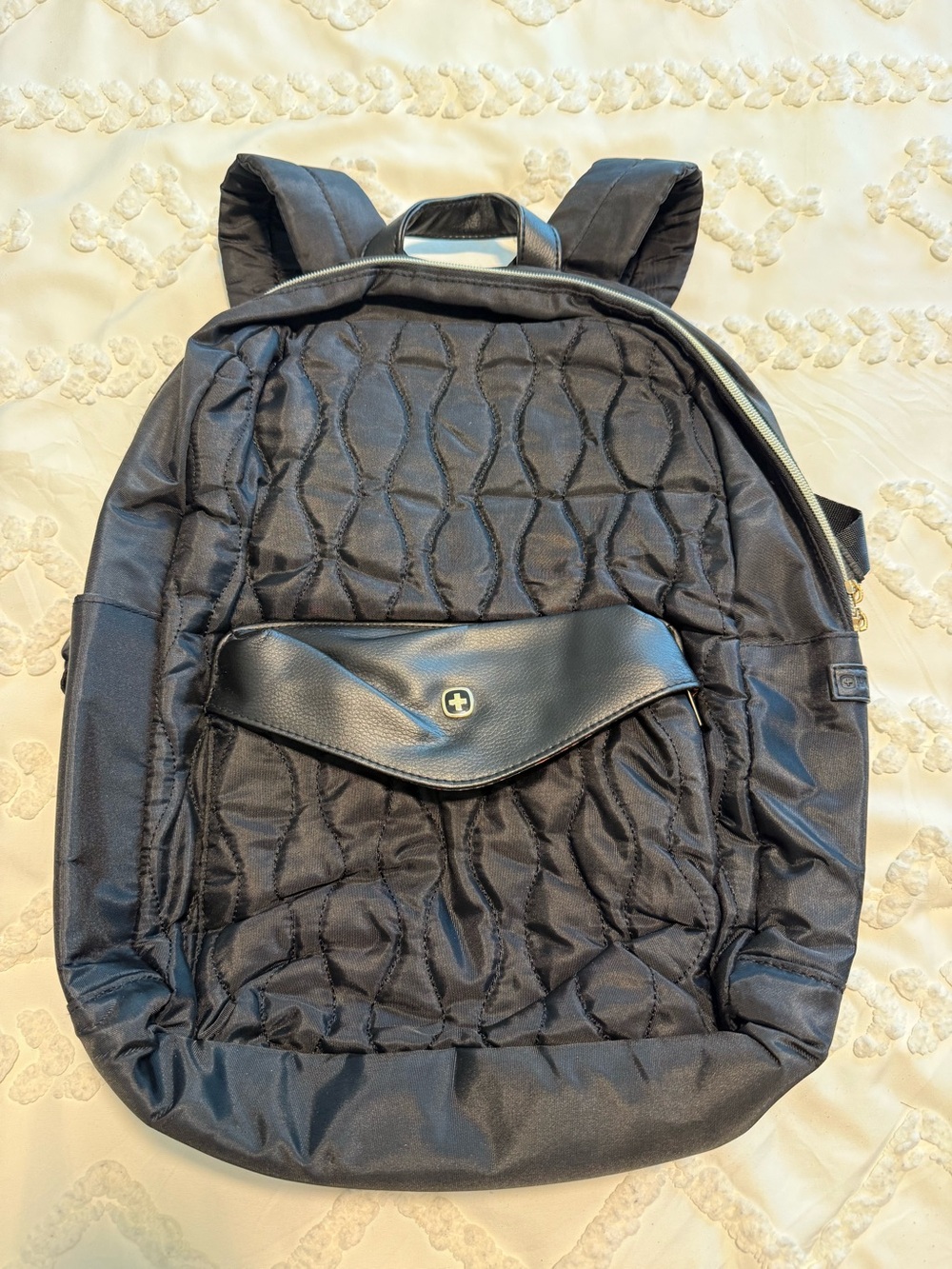 Wenger women’s black quilted backpack for day use